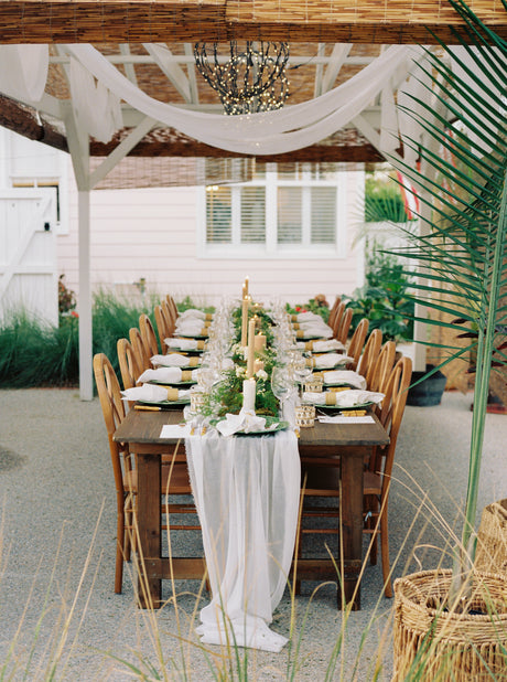 White Gauzy table runners for wedding table decor and events