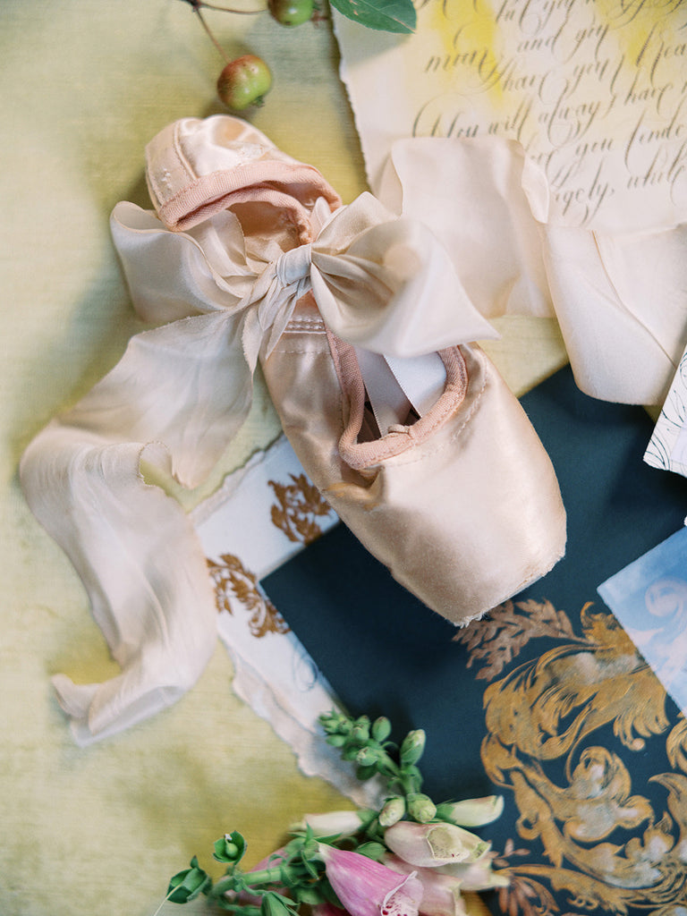 Hand dyed soft white silk ribbon for tying bows on wedding favors, floral arrangements, and wedding décor