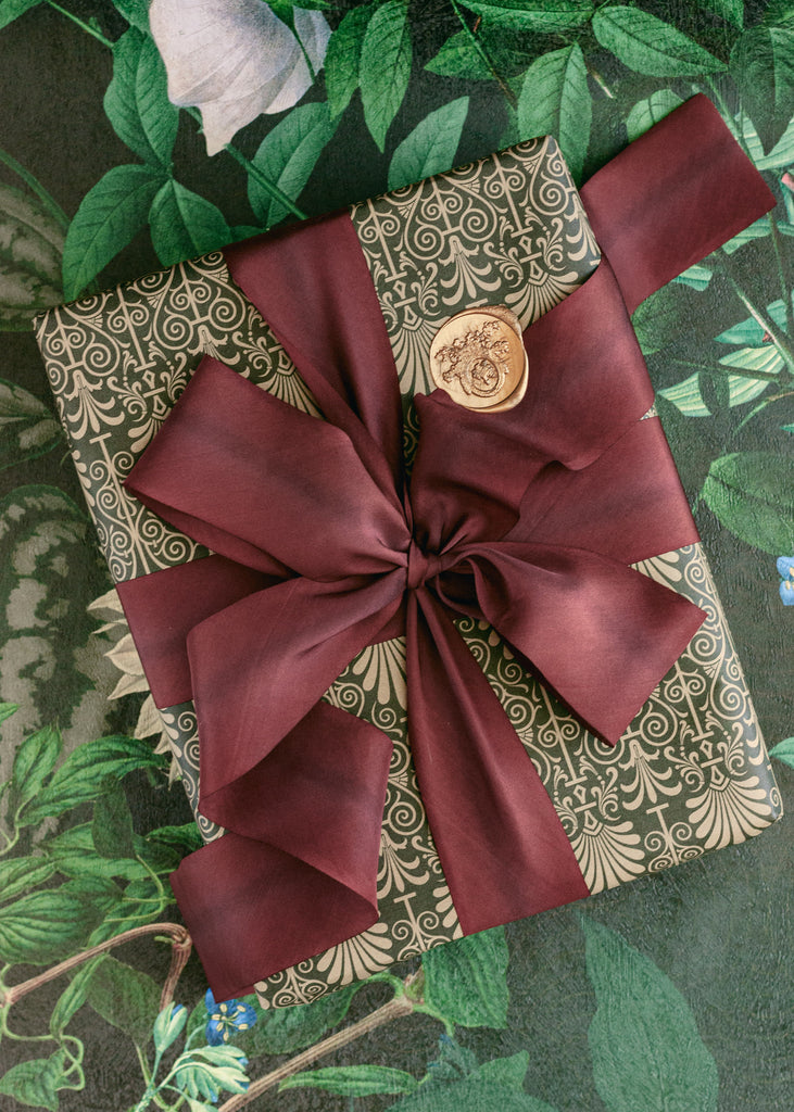 Burgundy silk ribbon for gift wrapping and holiday crafts