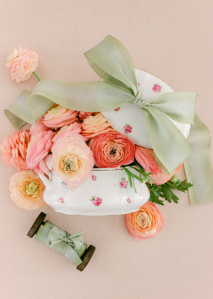 Flowing sage green silk ribbon hand-dyed for wedding stationery, gift wrapping, and décor