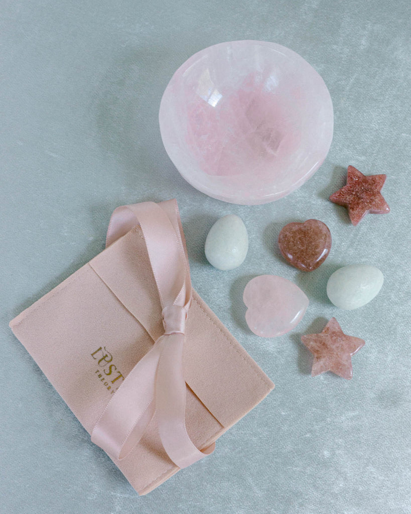 curated rose quartz Pink crystal gift set with bowl and hand carved crystal stones in a gift pouch