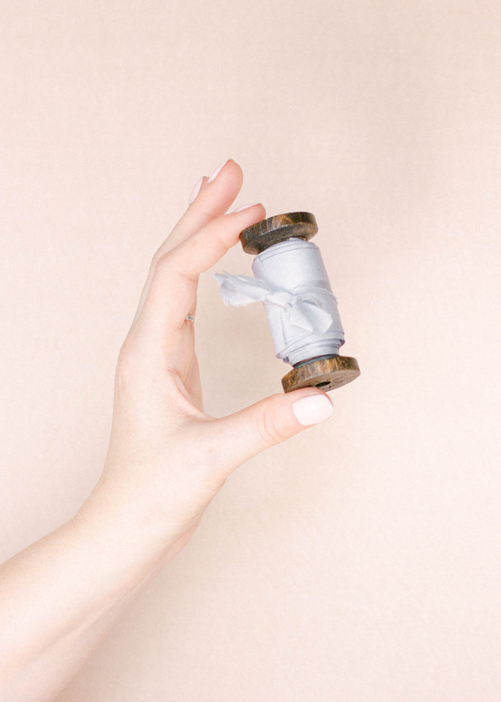 Luxury French blue silk ribbon for tying around wedding favors, bouquet stems, and event décor