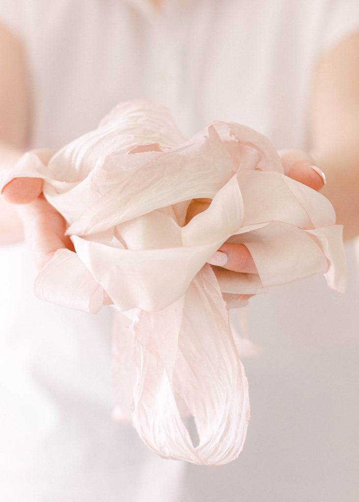 Luxury handmade pink silk ribbon for tying bows on wedding favors, bridal stationery, and event décor
